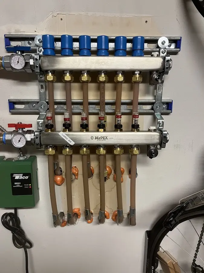 Plumber performing Water Heater Repair at a residential property in Edgefield